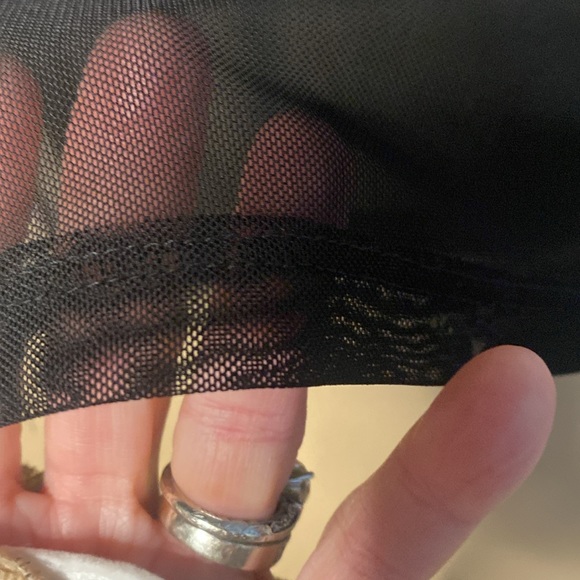 Very sheer top with beautiful floral appliqué. Choker style neckline. Size M. - Picture 2 of 3